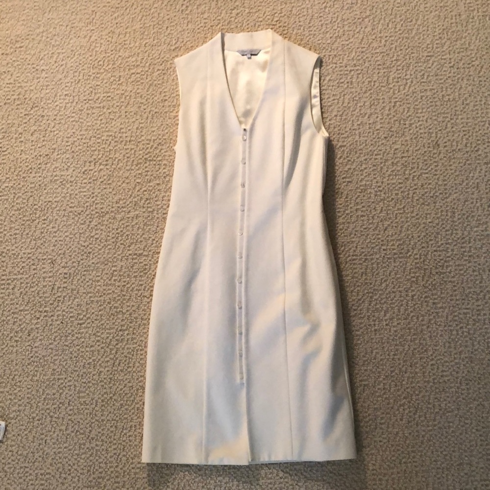 White sleeveless dress with front buttons